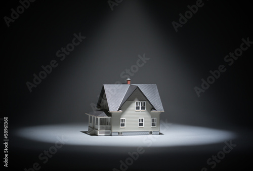 Close up of lighten model house on grey background