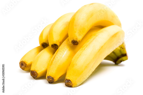 Close up of branch of bananas, isolated on white