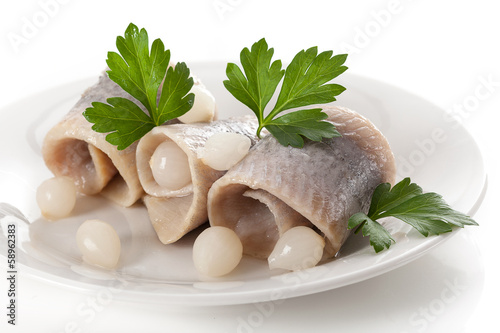 Delicious herrings with picle onions photo