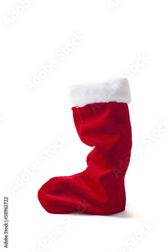 red Christmas stocking standing on white background