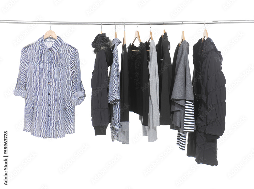 female fashion clothing, jacket, coat on hangers at the show female fashion clothing, jacket, coat on hangers at the show