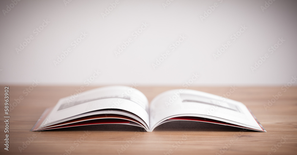 Open book on wooden deck Open book on wooden deck