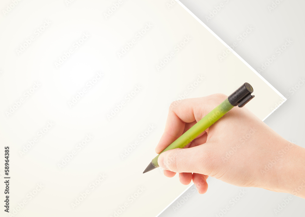 Hand writing on plain empty white paper copy space Hand writing on plain empty white paper copy space