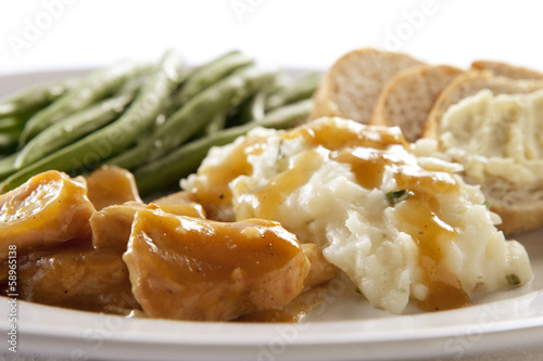 Obraz na plátně Turkey and Gravy Dinner with Mashed Potatoes, Green Beans
