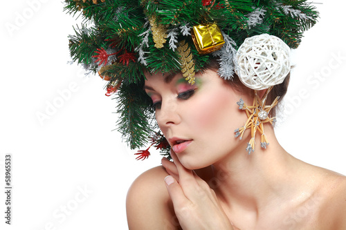 New Year and Christmas Tree Holiday Hairstyle and Make up. photo