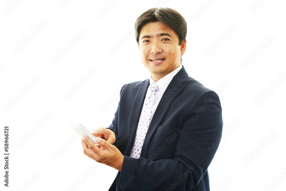 通話中の笑顔のビジネスマン 通話中の笑顔のビジネスマン