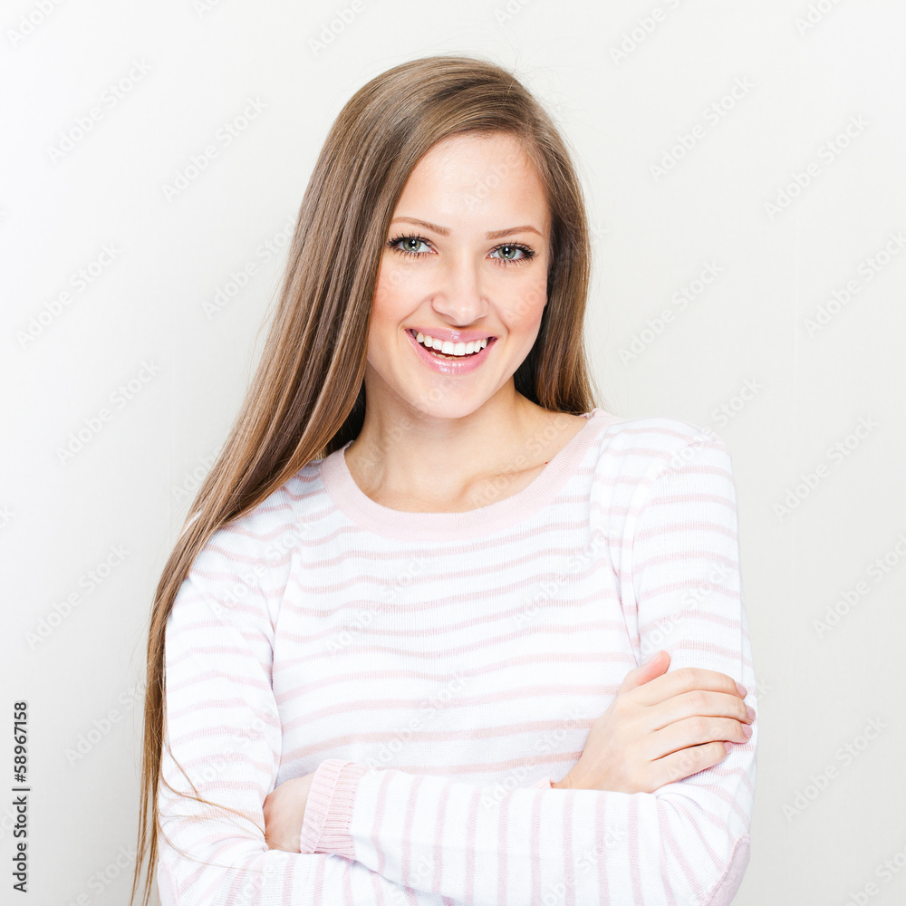 Young casual style woman portrait isolated over white background Young casual style woman portrait isolated over white background