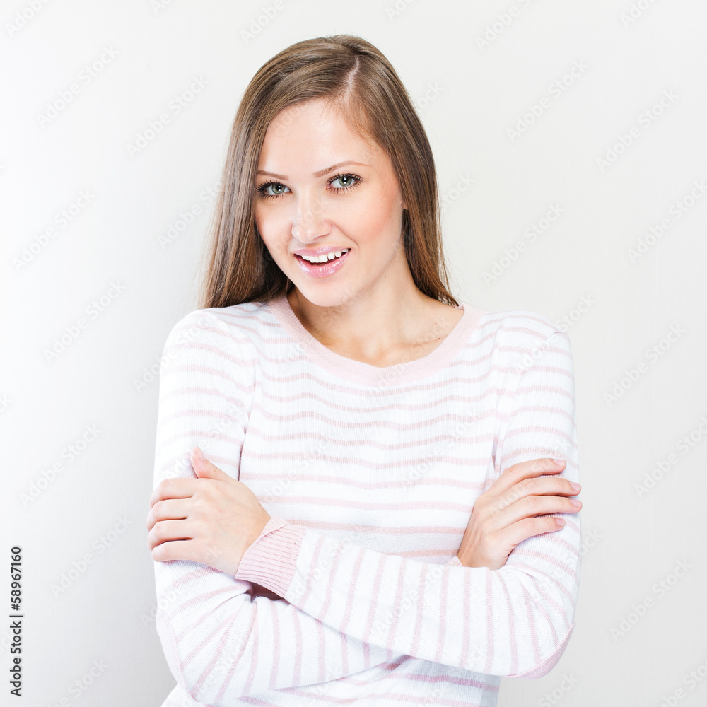 Young casual style woman portrait isolated over white background Young casual style woman portrait isolated over white background