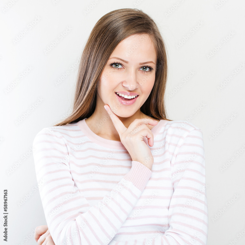 Young casual style woman portrait isolated over white background Young casual style woman portrait isolated over white background