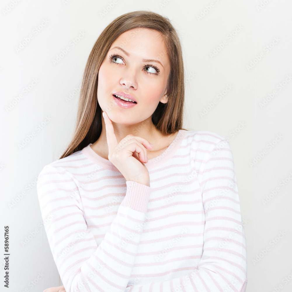 Young casual style woman portrait isolated over white background Young casual style woman portrait isolated over white background