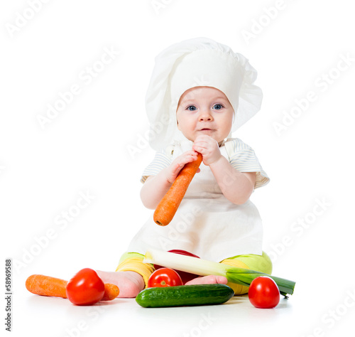baby girl with vegetables