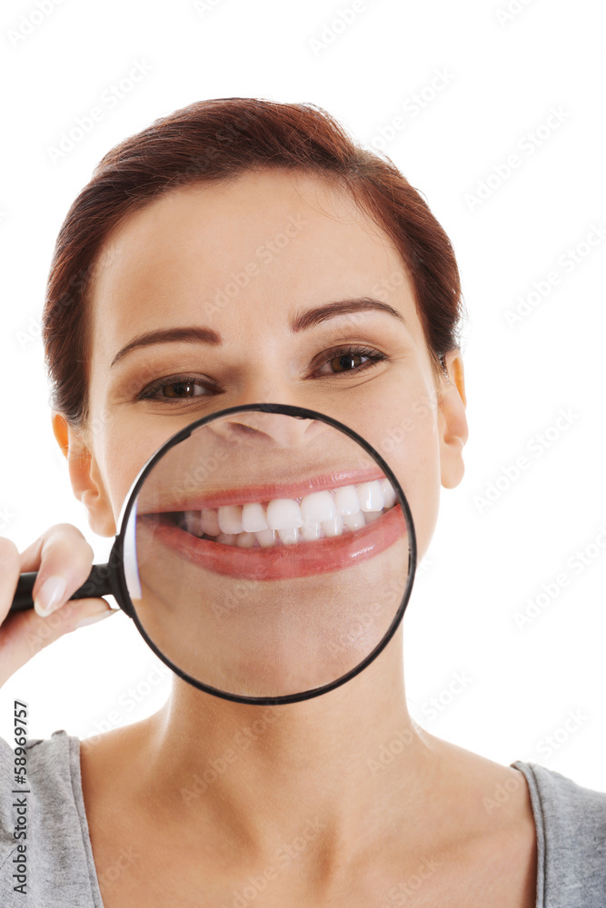 Young beautiful woman with magnifying glass. Young beautiful woman with magnifying glass.