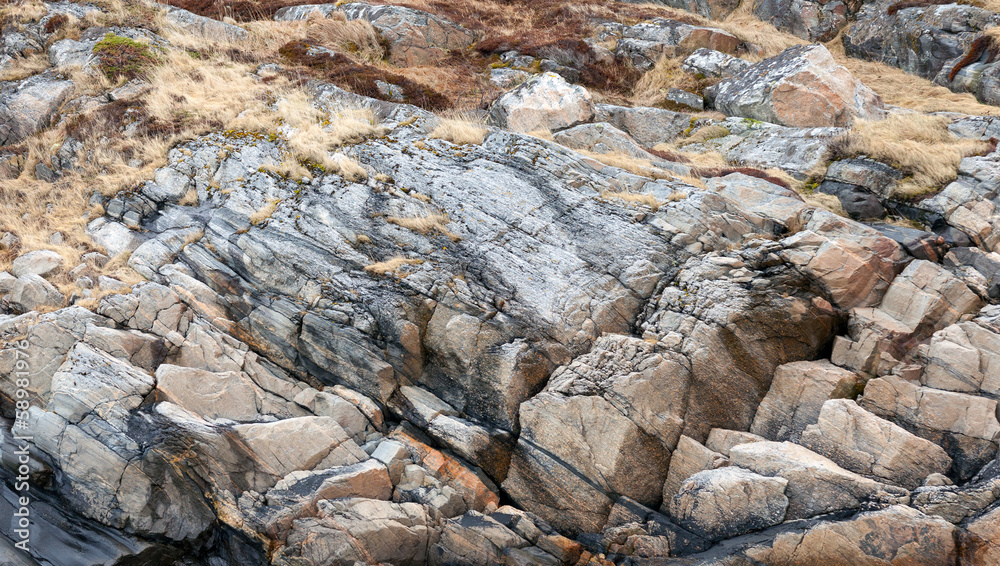 Natural photo background texture of stone coast in Norway