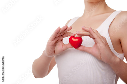 Woman with heart love symbol isolated on white