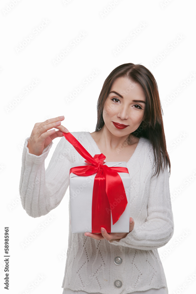 Happy young woman with birthday present in hands Happy young woman with birthday present in hands