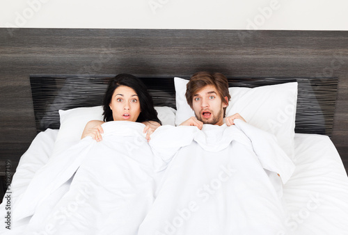 young couple bed photo