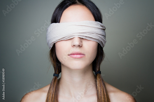 Naked blindfold woman photo