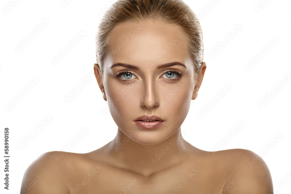 Beautiful portrait of a girl. Nude makeup. White background. Beautiful portrait of a girl. Nude makeup. White background.