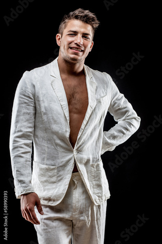 young man wearing white suit © Anatoly Repin
