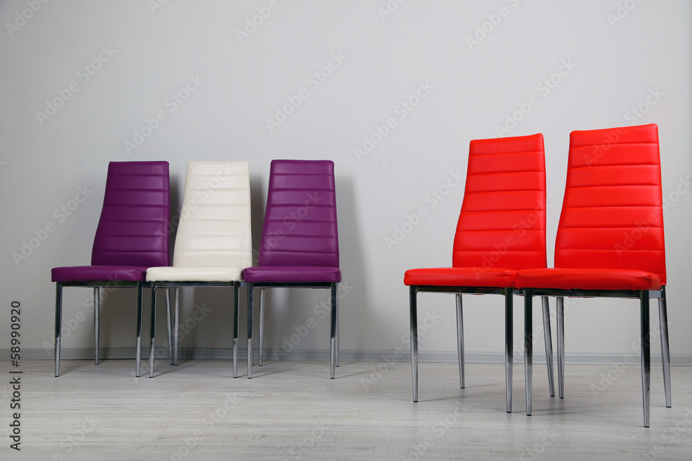 Obraz premium Modern color chairs on wall background