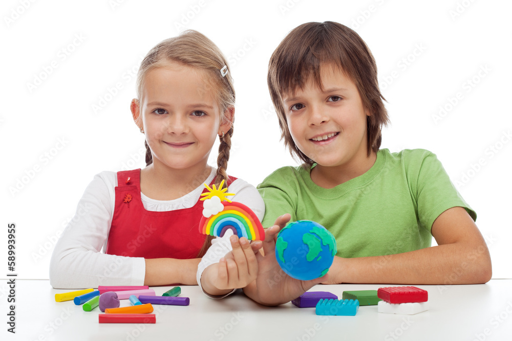 Kids making ecology theme clay figures Kids making ecology theme clay figures