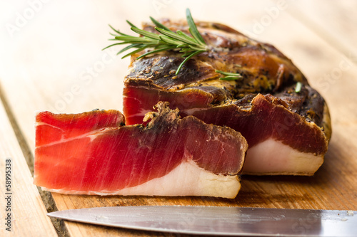 Billede på lærred Tasty slices of Italian speck