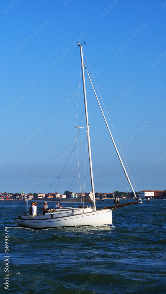 Naklejka premium yacht at the pier in Venice, Italy, Europe