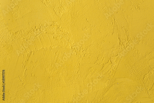 yellow textured wall. background