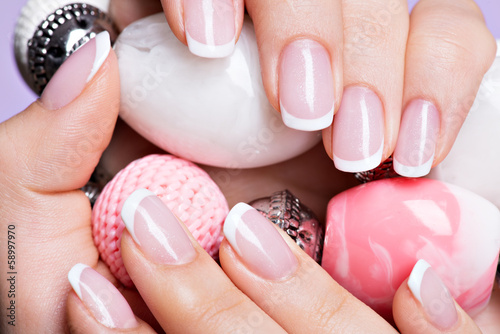 woman s nails with beautiful french white manicure