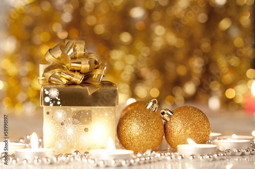 Gift box, candles and Christmas balls