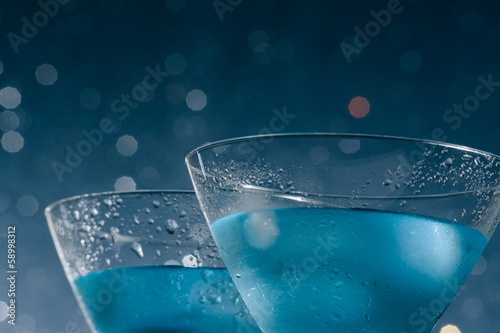 glasses of fresh blue cocktail with ice