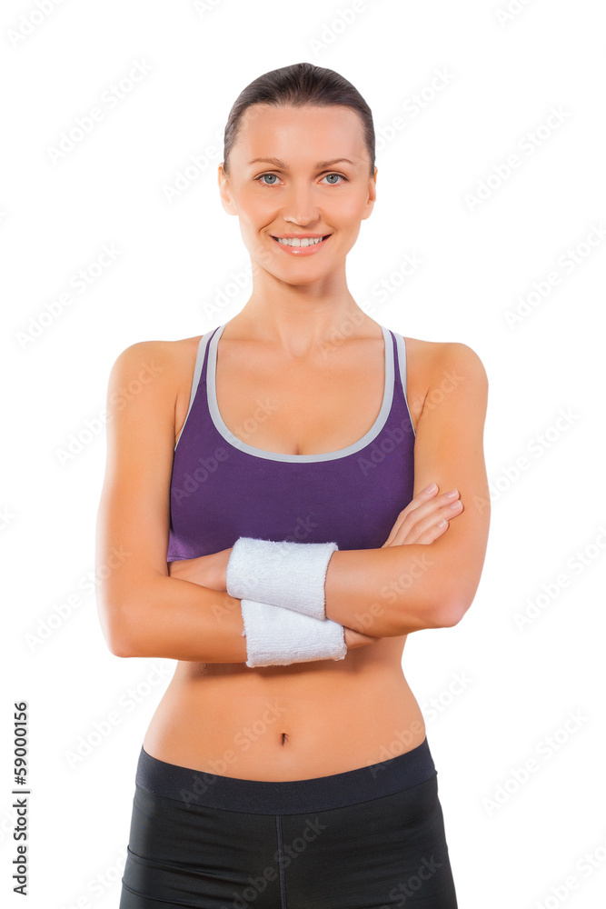 Sports woman portrait isolated on white background. Smiling fema Sports woman portrait isolated on white background. Smiling fema