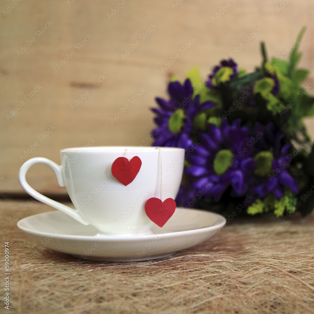 Cup of tea with heart teabag Cup of tea with heart teabag