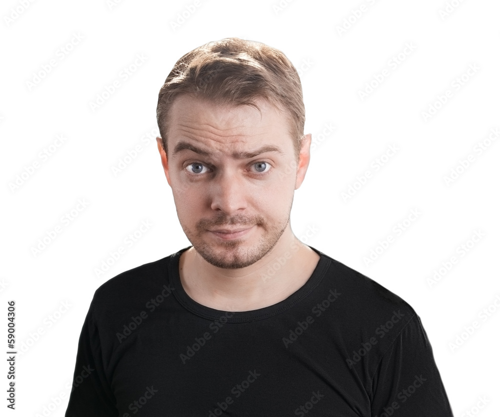 Young man isolated on white with pensive expression. Young man isolated on white with pensive expression.