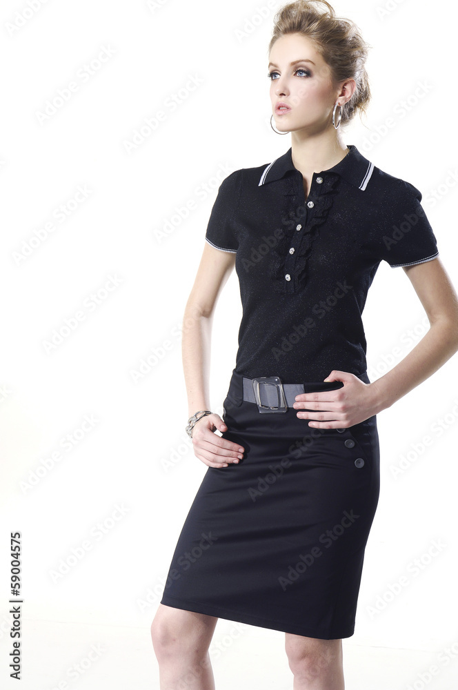 portrait of young girl is in fashion style in black dress posing portrait of young girl is in fashion style in black dress posing