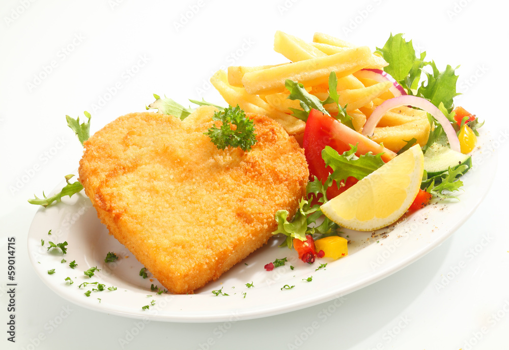 Delicious golden heart shape veal escalope