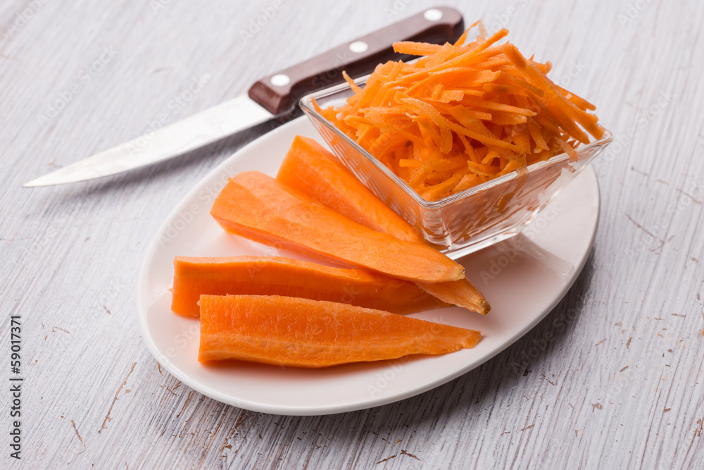 Grated carrots on board Grated carrots on board