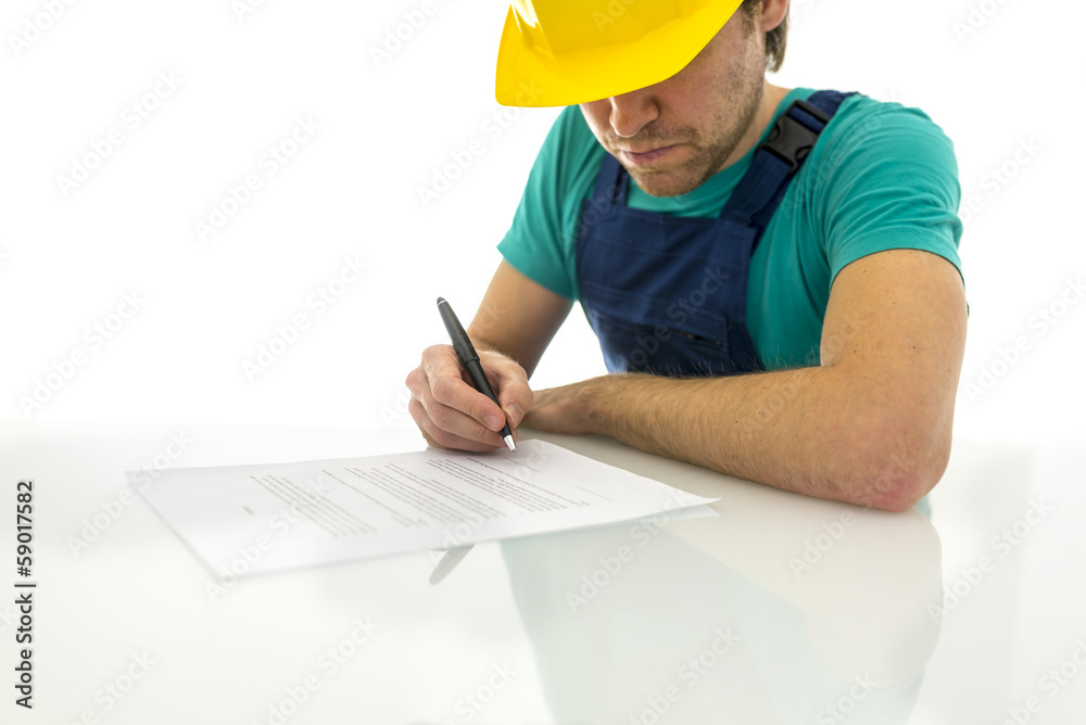 Construction worker signing contract Construction worker signing contract
