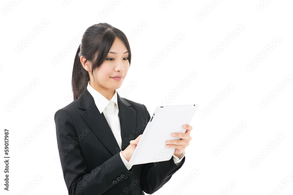 asian businesswoman using tablet on white background asian businesswoman using tablet on white background