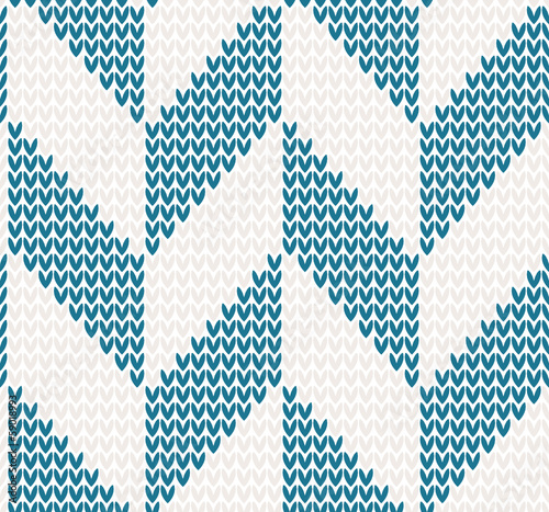 Seamless knitted pattern in blue and beige color