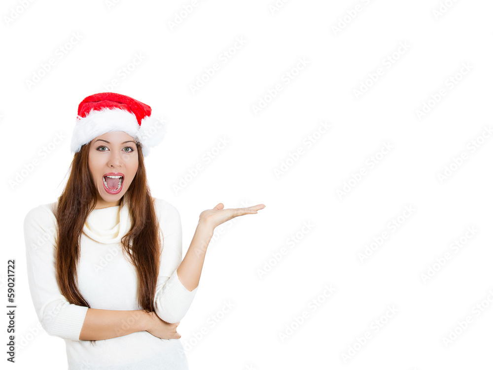 Young beautiful christmas woman pointing at copy space Young beautiful christmas woman pointing at copy space