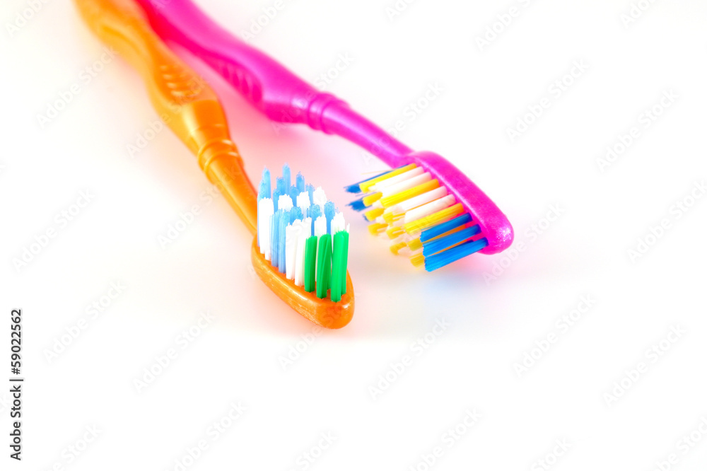 Two tooth-brushes Two tooth-brushes
