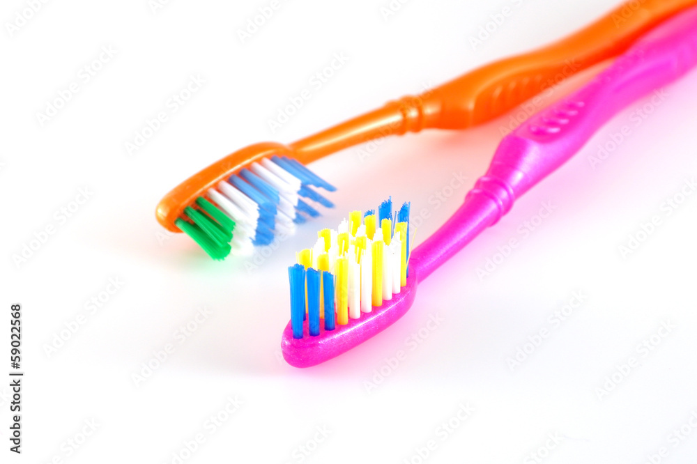 Two tooth-brushes Two tooth-brushes