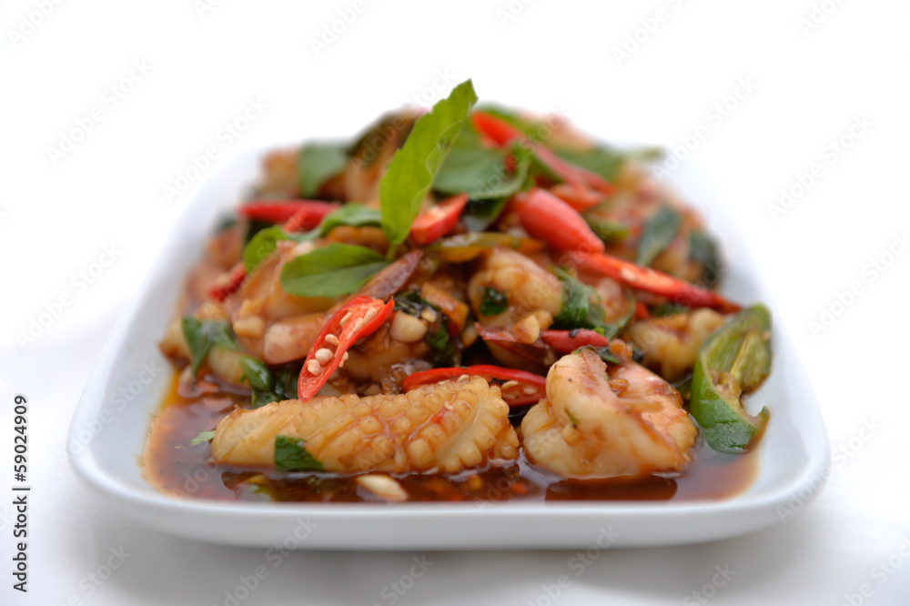 Thai fried shrimp and squid in basil sauce Thai fried shrimp and squid in basil sauce