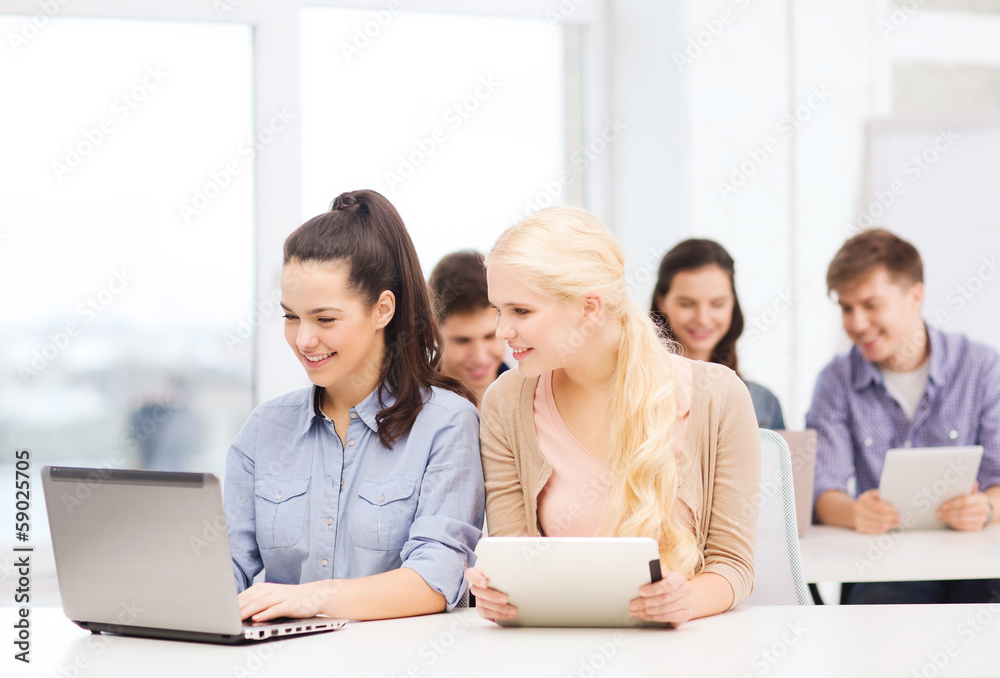 students with laptop, tablet pc and notebooks students with laptop, tablet pc and notebooks
