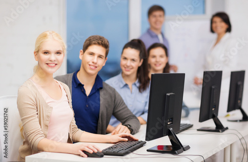 students with computer monitor at school