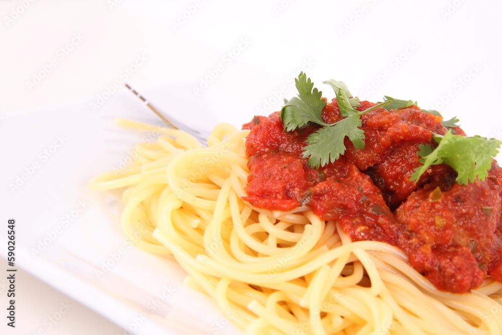 Pasta with meatballs decorated with coriander Pasta with meatballs decorated with coriander