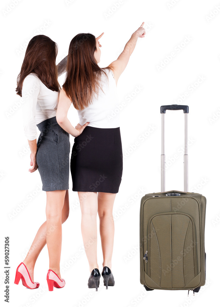 back view of businessteam traveling with suitcas. back view of businessteam traveling with suitcas.