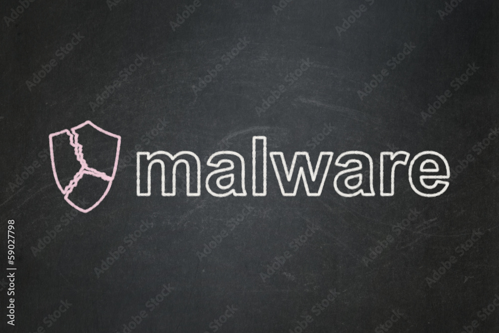 Obraz premium Safety concept: Broken Shield and Malware on chalkboard