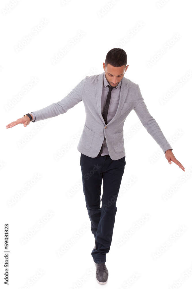 Young african american business man walking on a line - Black pe Young african american business man walking on a line - Black pe